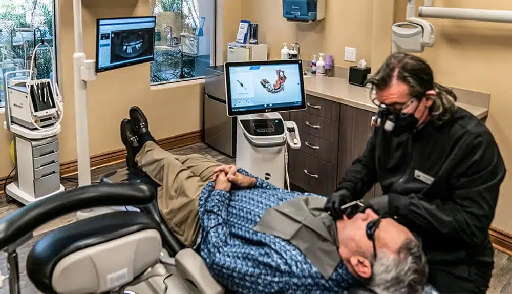 Dr. Rod Strober providing dental care at Country Club Dentistry