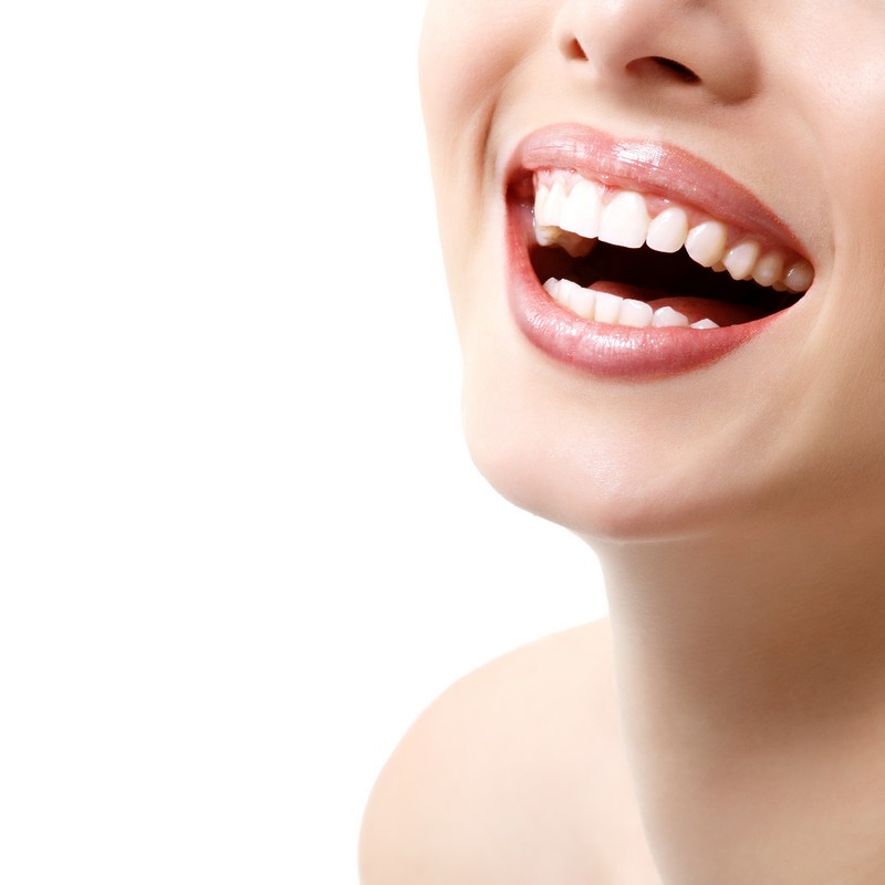 Patient smiling and considering dental bonding at Country Club Dentistry