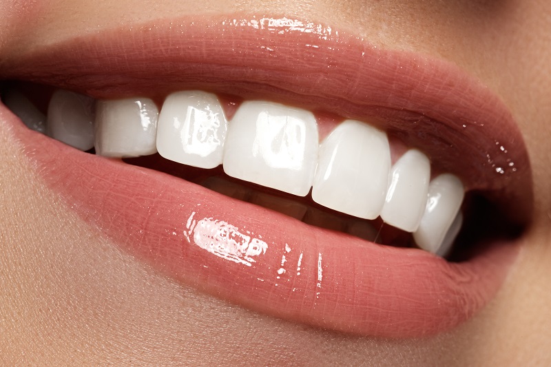 Healthy natural-looking smile after restorative dental care