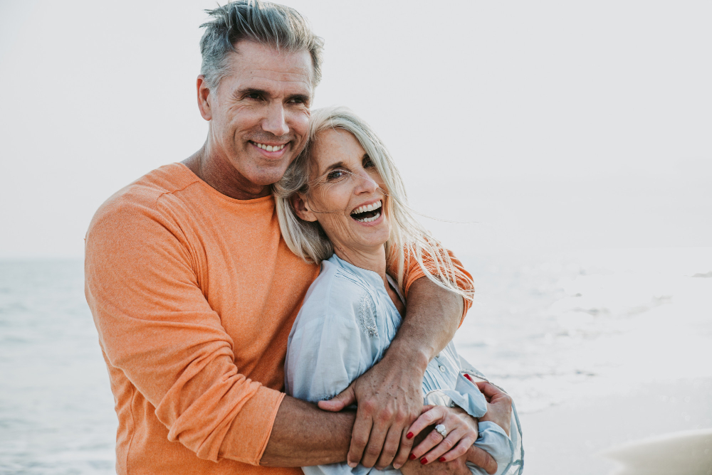 Smiling woman representing personalized FOY denture treatment
